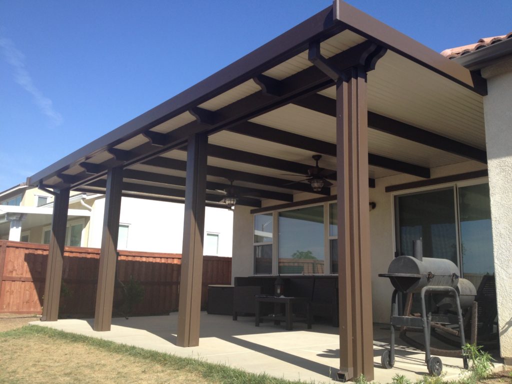 Newport Solid cover over an outdoor kitchen and bar area