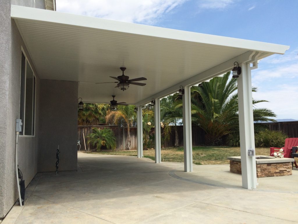 Newport Solid cover along a side yard with palm trees