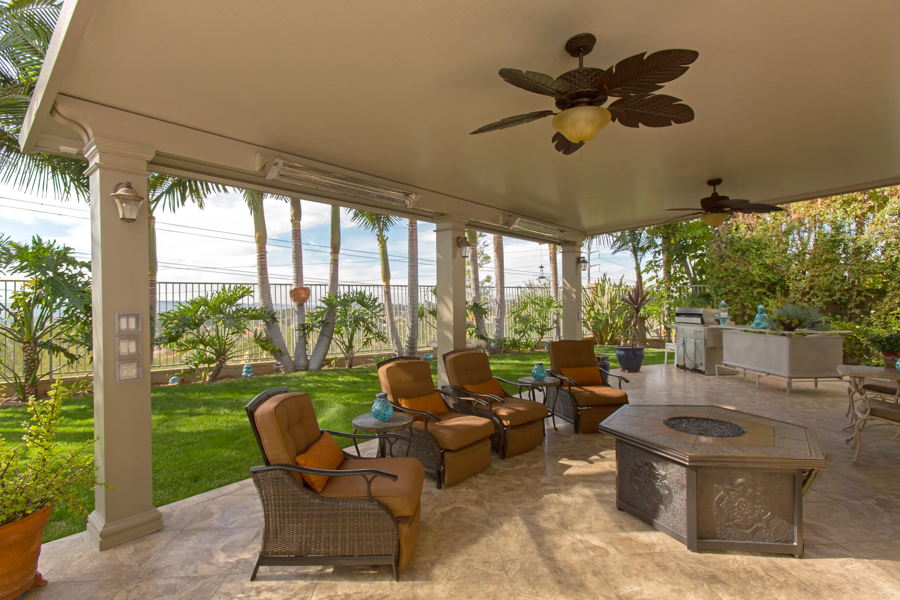 Insulated patio cover with columns over a paver patio