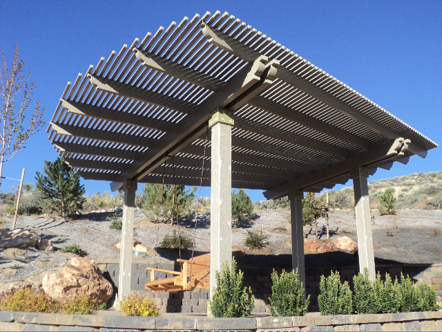 Graphite freestanding lattice pergola in desert landscaping