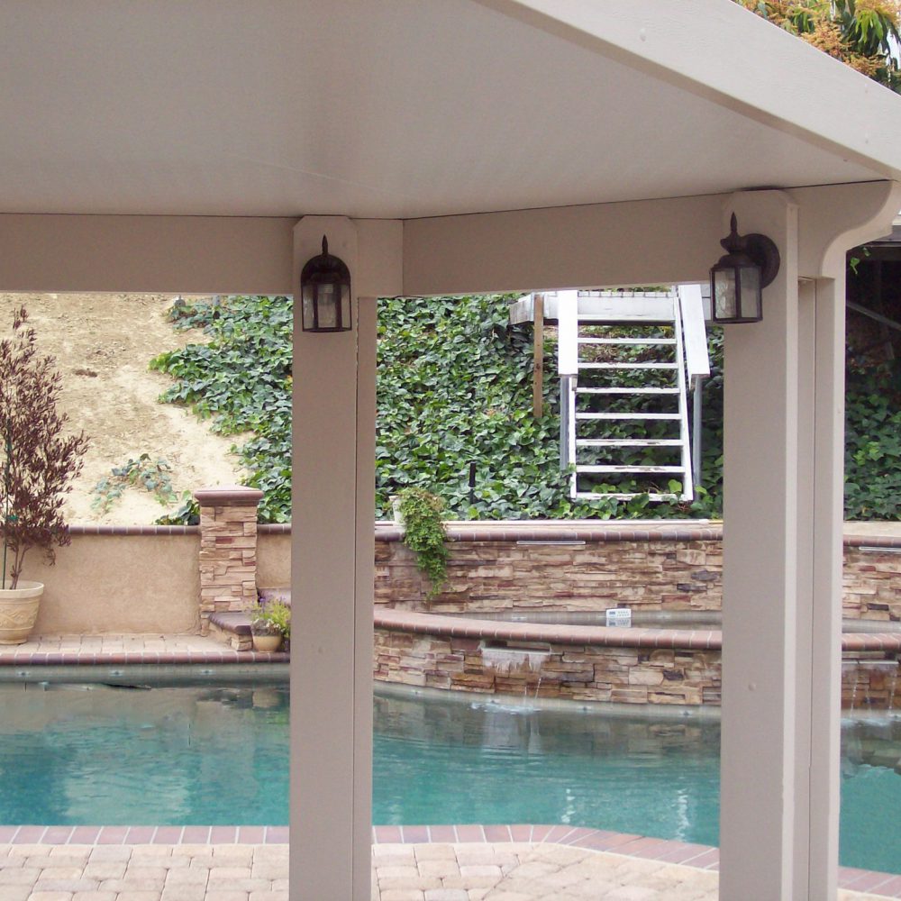 Insulated cover over a tiered pool area, aerial view