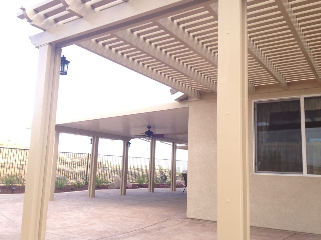 Laguna Lattice cover with lantern posts on a hillside patio
