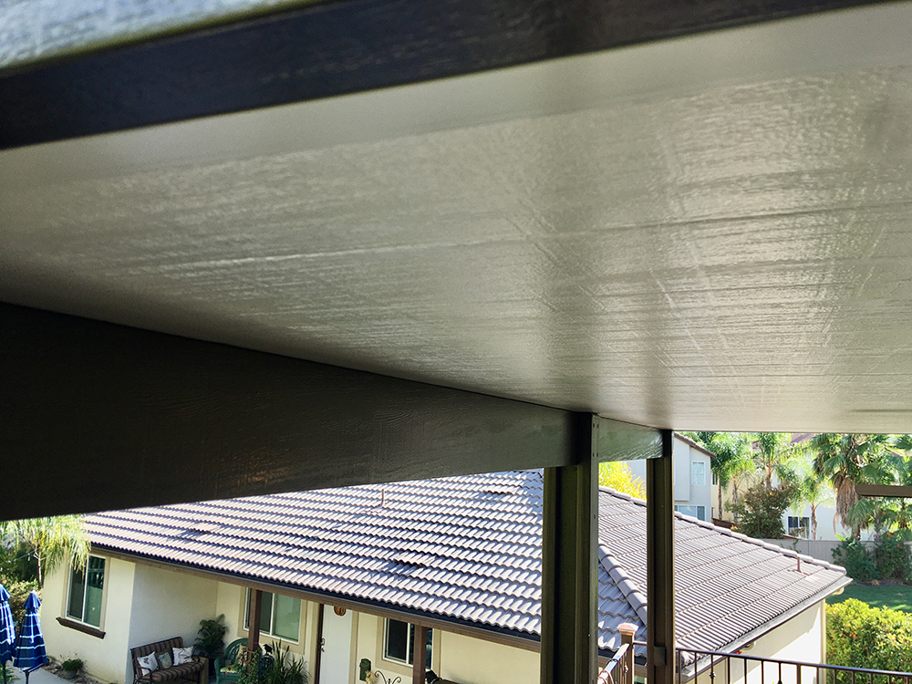 The insulated underside of a Maxx Panel patio cover showing panel thickness